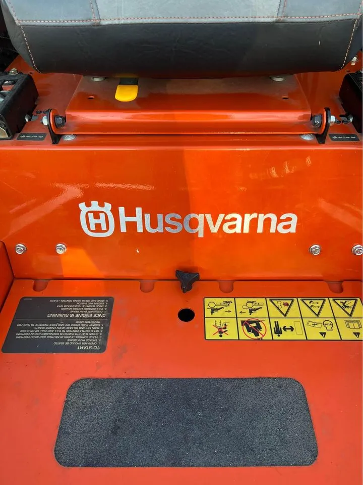 Husqvarna logo on mower